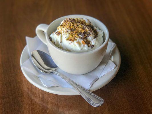 Cannoli Gelato (compliments of il Dolce Gelato) topped with chopped chocolate and pistachios.