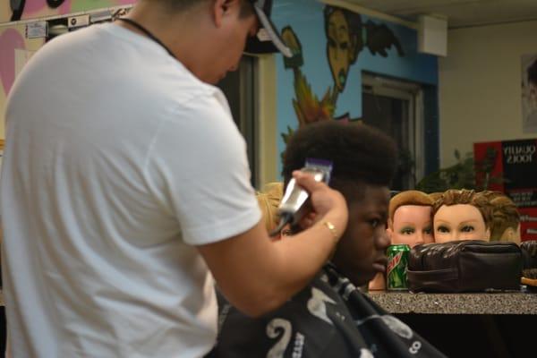 One of The Beauty Institute Barber Student at work on our Clinic floor.