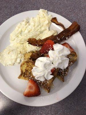 Deuces Wild! Egg whites, bacon, French toast w fresh strawberries and whipped cream!