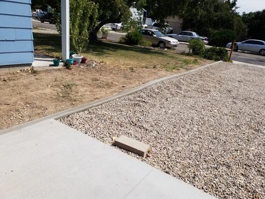 The curb will help keep the rock out of my neighbors yard.