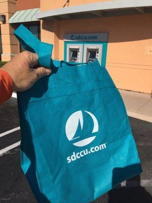 Checking in got me a free SDCCU shopping bag. How many times do I have to run back out to the car to get it after I'm done shopping?