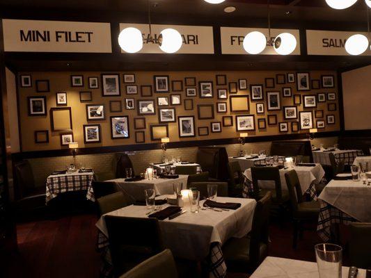 A dining room view, and plenty of tables.