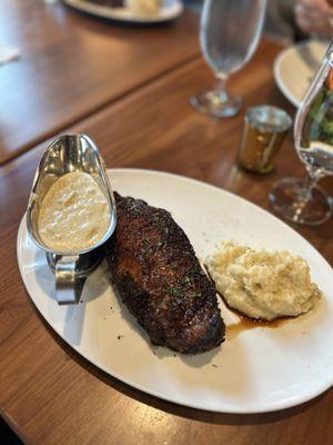 By NY Strip with blue cheese sauce