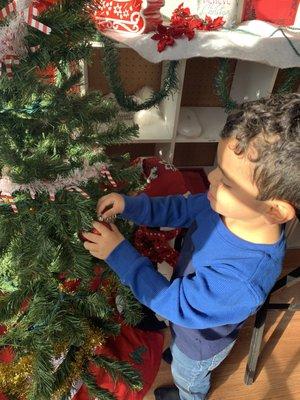 Santa's little helpers decorated our school Christmas tree!