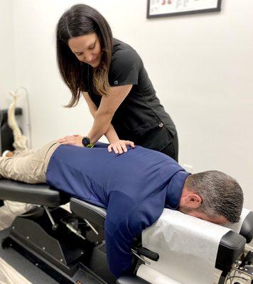 Dr Stefanie Tropea, DC ProClinix Armonk Chiropractor utilizing flexion distraction for low back pain and herniated discs