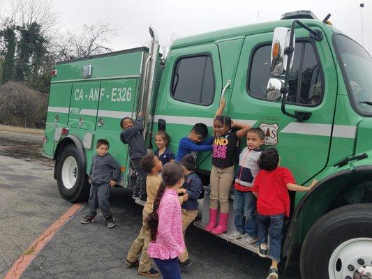 Students got to go in the firetruck and spray the hose!