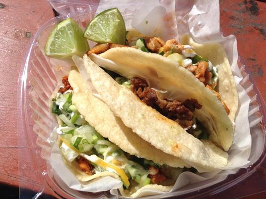 Al pastor, steak, and chicken tacos.