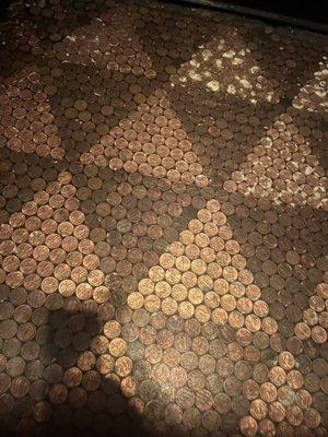 Pennies were used for the restroom floor.