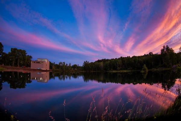 The Salt Pump building basking in a fiery sunset.