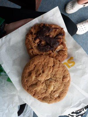 White chocolate macadamia nut cookie and a S'mores cookie (The chocolate on top looked like a mermaid.)