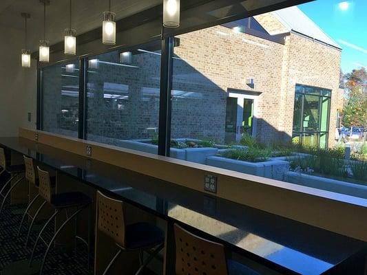 Studying, charging station, people watching, reading bar, all rolled into one at the newly remodeled Savage Branch Library!