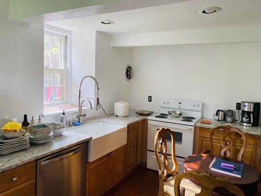 Kitchen with farm sink.