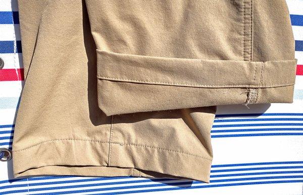 Tan pants hemmed