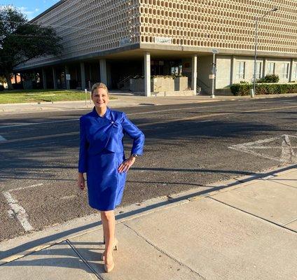 Attorney Christy L. Cauthen in front of the Ector County Courthouse