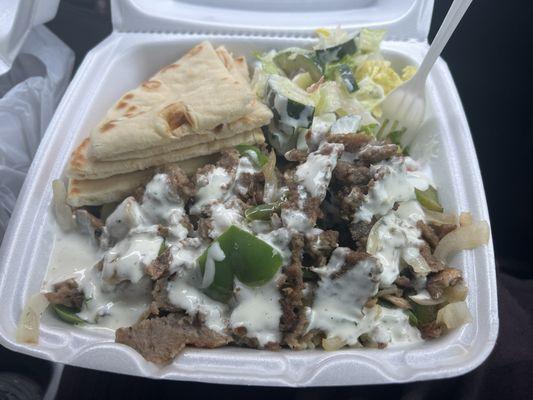 Beef & Lamb plate w/onion, mushrooms, Bellpepper with rice and mixed salad! Delightfully delicious!