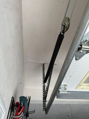 After replacing the Extension Spring and Cables for Safety. This is how a Garage Door Extension Spring should look.