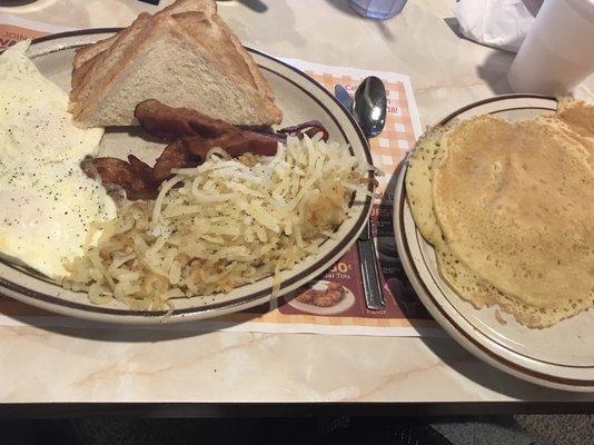 Big Country breakfast with hash browns bacon and white toast