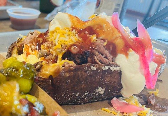 Loaded baked potato topped with brisket. Yum!