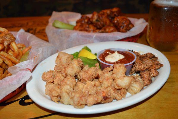 Can't decide? Dive into a delicious dilemma! Which will you choose to pair with your ice-cold beer: fiery Hot Wings or exotic Gatorbite