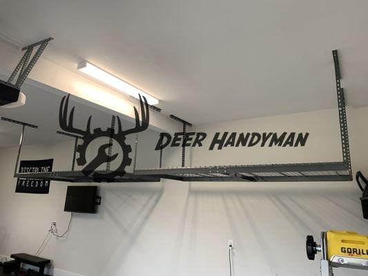 Overhead garage storage racks installation with Deer Handyman service in Huntersville and surrounding areas