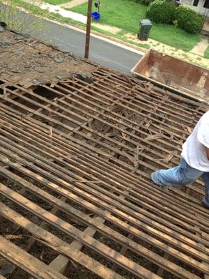 Reroof with 5 layers down to the decking and rebuilt