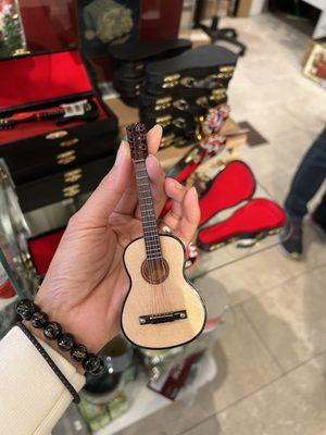 Beautiful stuff in this shop. Cute little guitar