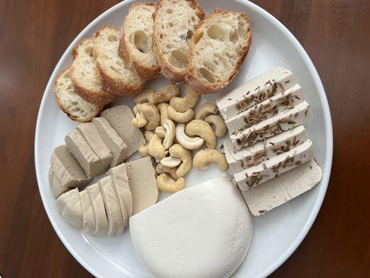 Vegan mozzarella, mushroom Brie, truffle Brie and rosemary Asiago.