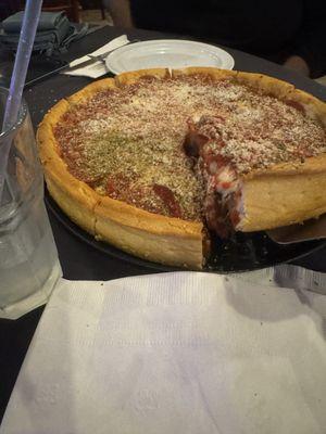 Chicago deep dish cheese pizza with half extra Italian seasoning