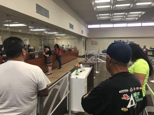 Long lines and two tellers. I counted eight total BoA employees. The other six are above the pay grade to service customers at the window.