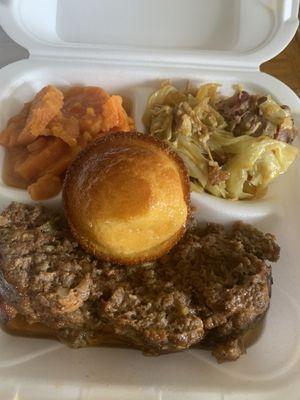 Delicious meatloaf,yam's fried cabbage, cornbread muffin