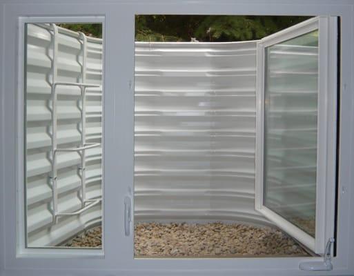 2-Lite Casement Window w Corrugated Steel Well