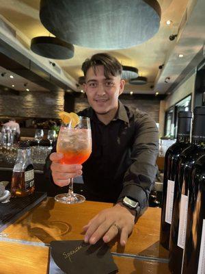 Fernando in the Bar area making my Aperol Spritz!