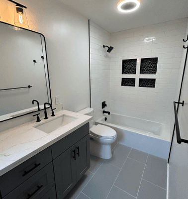 Bathroom remodel with tile installation and granite