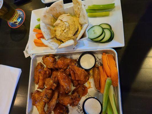 18 wangs. Hummus veggie plate.