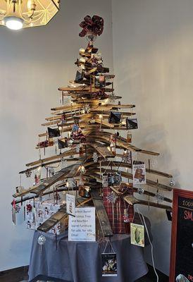 Tree made of bourbon barrel staves. Pretty cool.