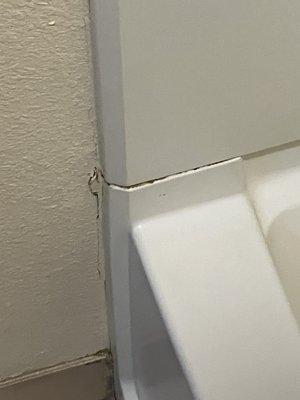 Grime buildup on the bathtub