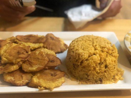 Yellow rice and beans and tostones