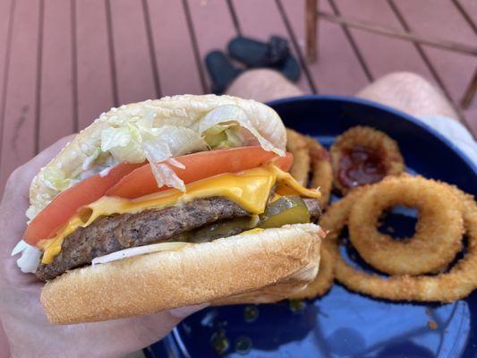 Double cheeseburger with onion rings.