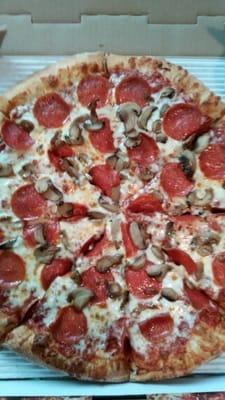 Delicious pepperoni & mushroom pizza!  They also have garlic butter you can add to it!