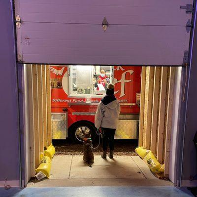 Quick Chef Inc. food truck setup so you can order from inside The Boneyard in the winter