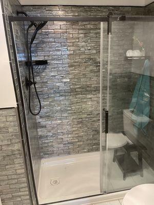 Shower wall with new glass shower door