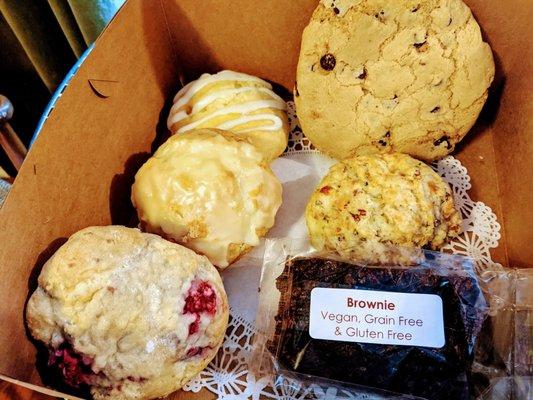 Raspberry, lemon, mango(?) Scones, chocolate chip cookie, savory scone, brownie.