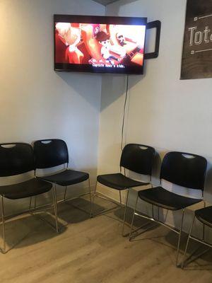 Small waiting area with tv