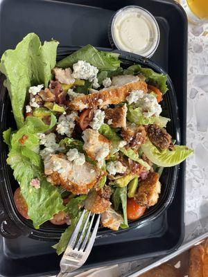 Hot honey friend chicken salad, Avocado, Tomatoes, Chicken, Romaine lettuce, Blue cheese & dressing,  Bacon So delish