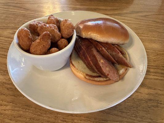 Jalapeño sausage sandwich and corn fritters