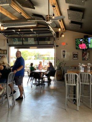 Indoor area with garage door to outdoor