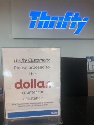 The sign in front of the thrifty stand.