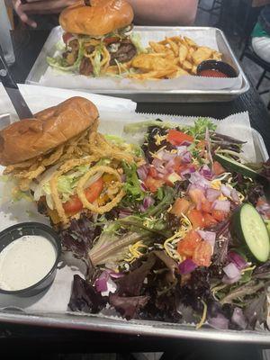 Blackened chicken sandwich and side salad