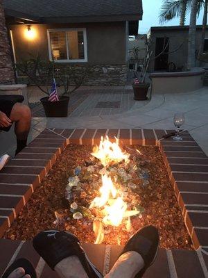 Share some laughter and drinks sitting around your fire pit