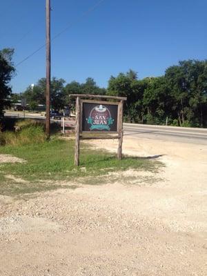 Sign at the bottom of the hill in downtown Leakey